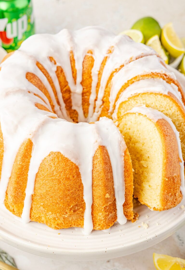 A bundt cake made with 7up on a cake stand