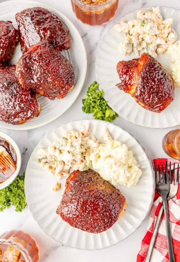 A serving of the chicken thighs with bbq sauce.