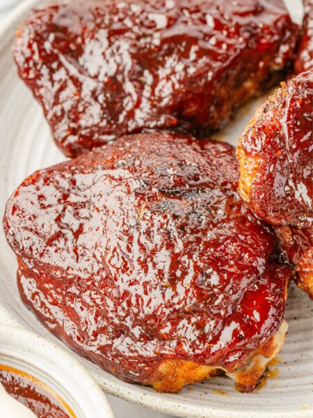 A barbecue chicken thigh that has been cooked