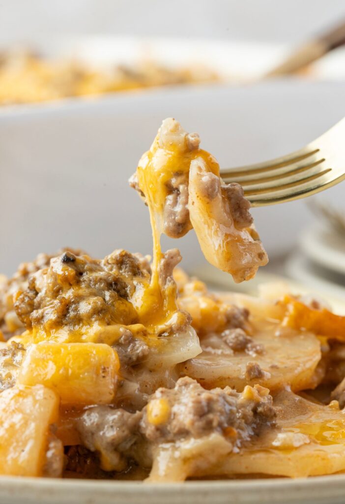 A serving of the casserole with a fork