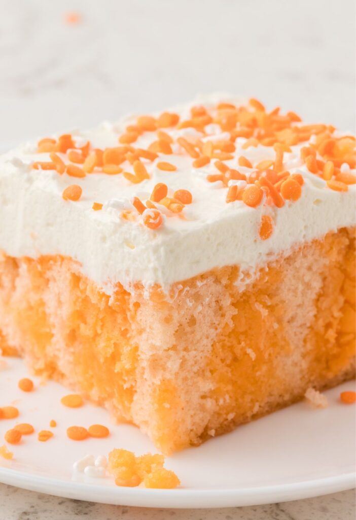 hero image of the orange crush poke cake