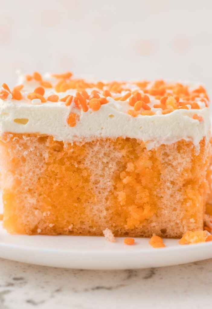 hero image of the orange crush poke cake
