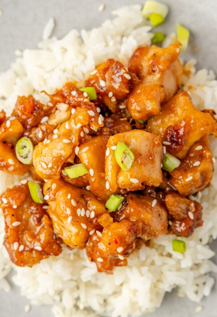 A serving of sweet chili chicken over white rice