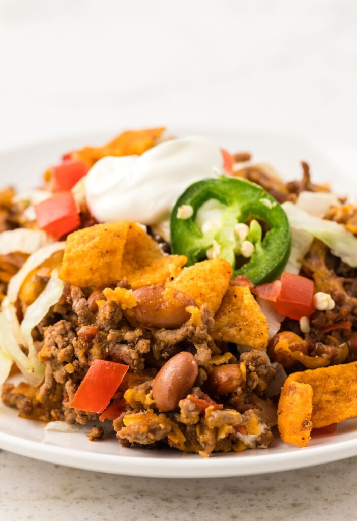 A serving of casserole on a white plate