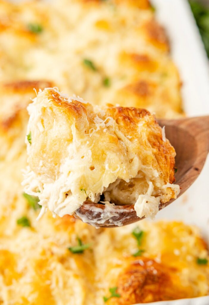 A casserole with a wooden spoon in it