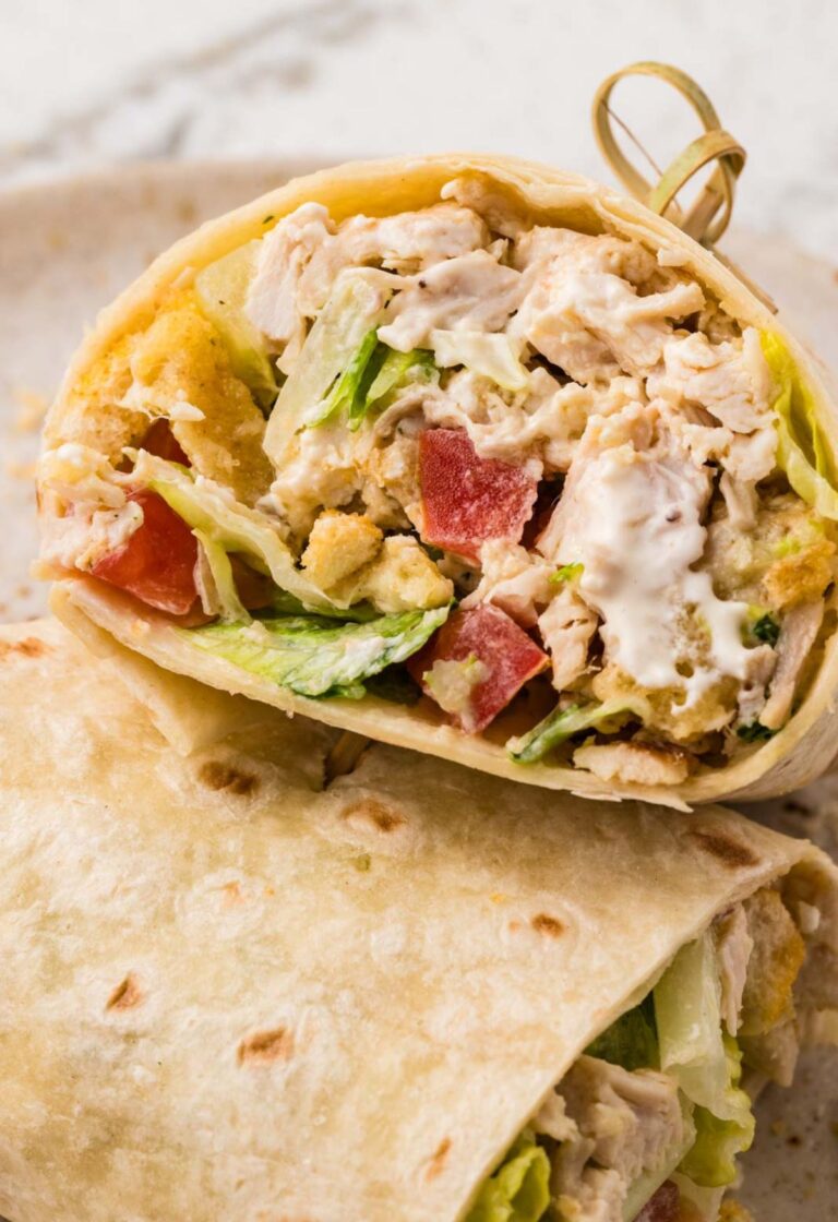 A chicken salad wrap with a toothpick in it