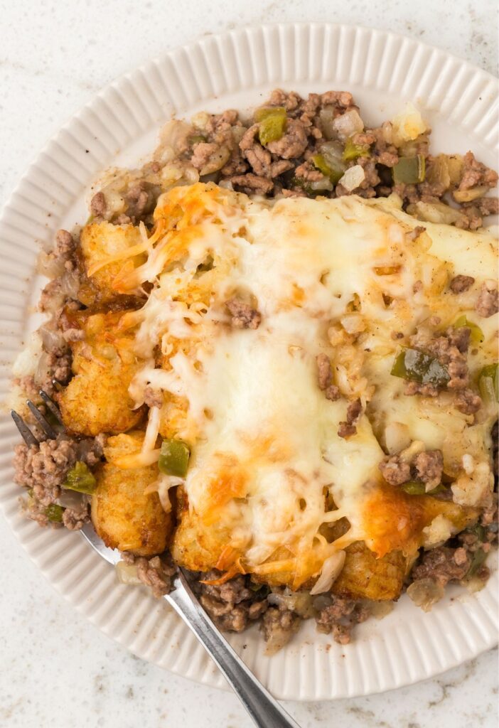A serving of the tater tot casserole with Philly cheesesteak ground beef.