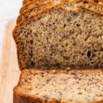 A loaf of banana bread that has been cut into slices.