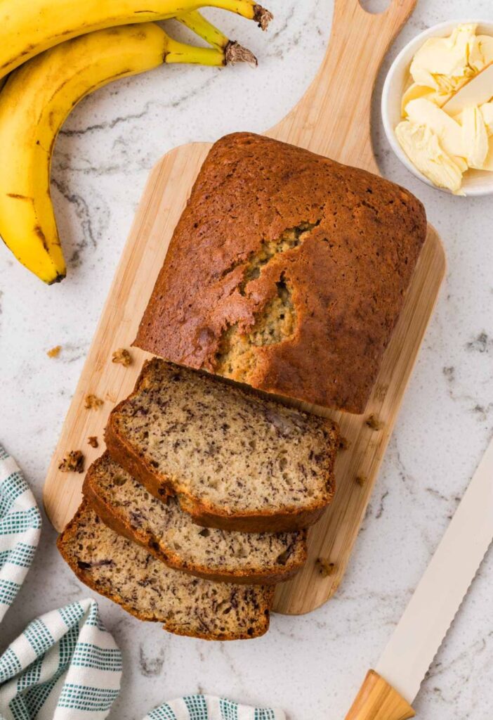 Loaf of baked banana bread with sour cream