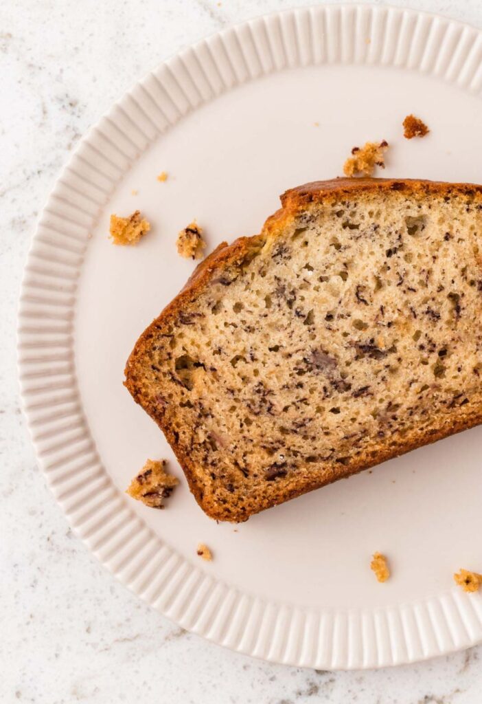 slice of banana bread on a white plate