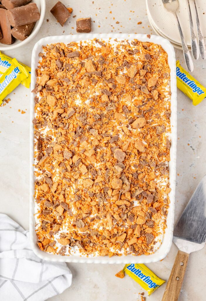 hero shot of the top of the cake pan with the cooked butterfinger cake inside of it ready to serve