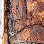Chocolate cobbler baked inside a white pan