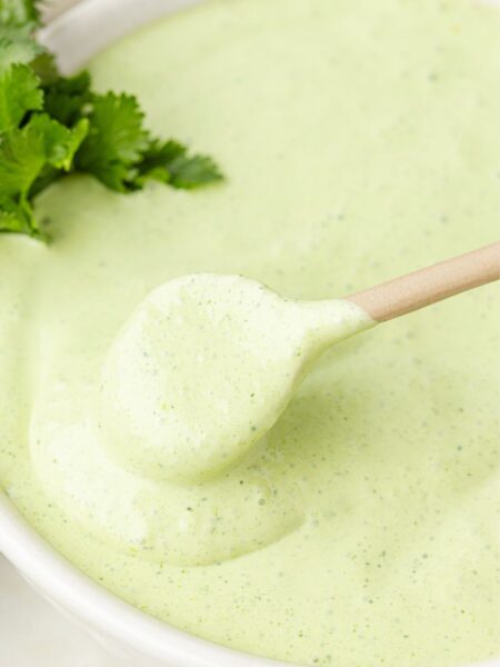 A white bowl of the cilantro lime sauce