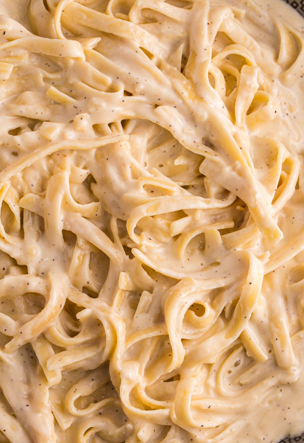 How To Make Copycat Olive Garden Alfredo Sauce - Together as Family