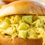 Close up of the sandwich with curry chicken salad in it