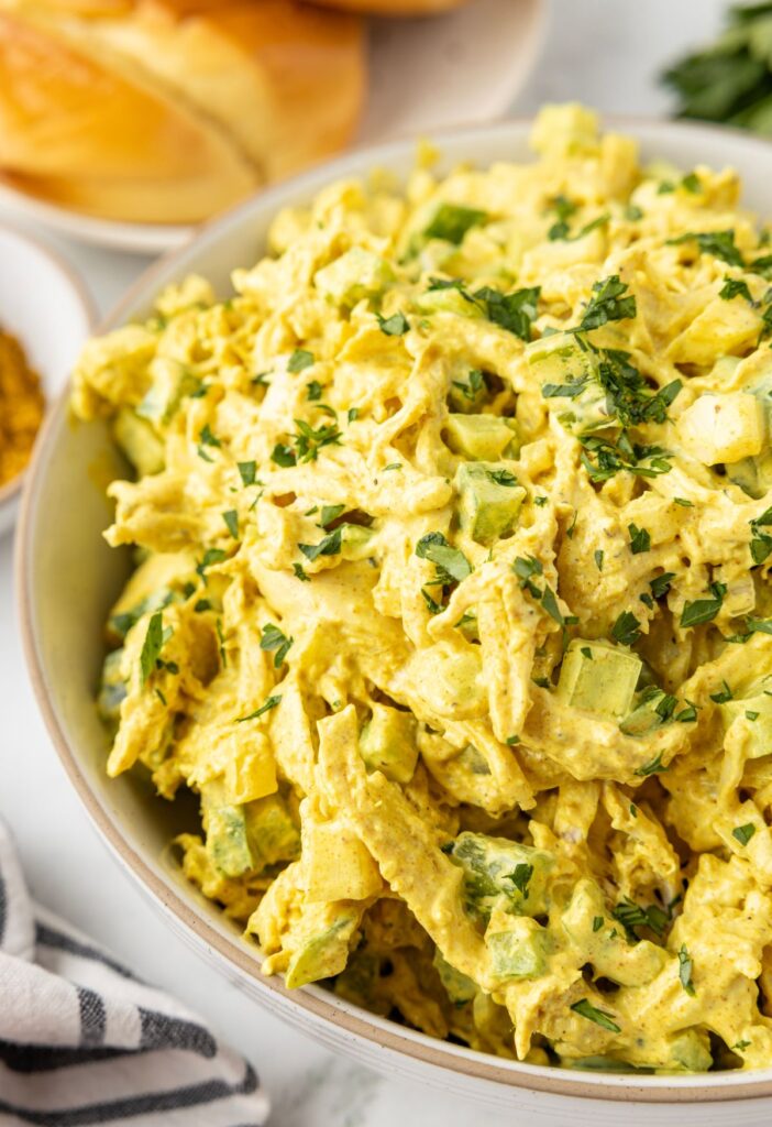 A bowl of curry chicken salad