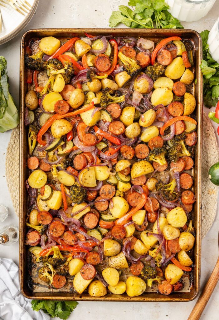 Top view of the sheet pan with vegetables and sausage