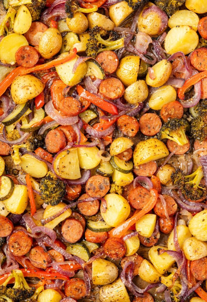 Close up of the sheet pan sausage and vegetables