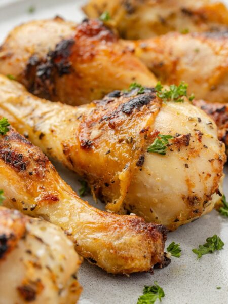 Oven baked chicken drumsticks ready to serve for dinner.