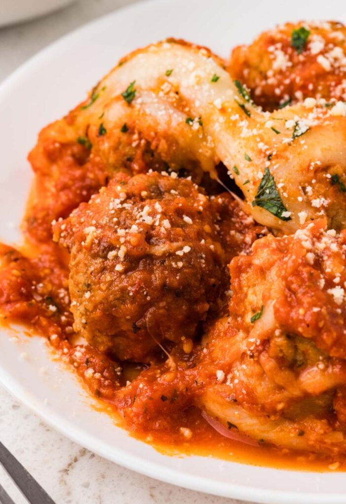 A serving of the parmesan meatballs made with frozen chicken meatballs.