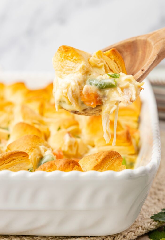 Casserole dish with a wooden serving spoon