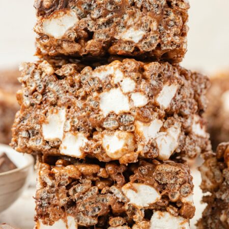 Stack of chocolate rice Krispy treats with mini marshmallows