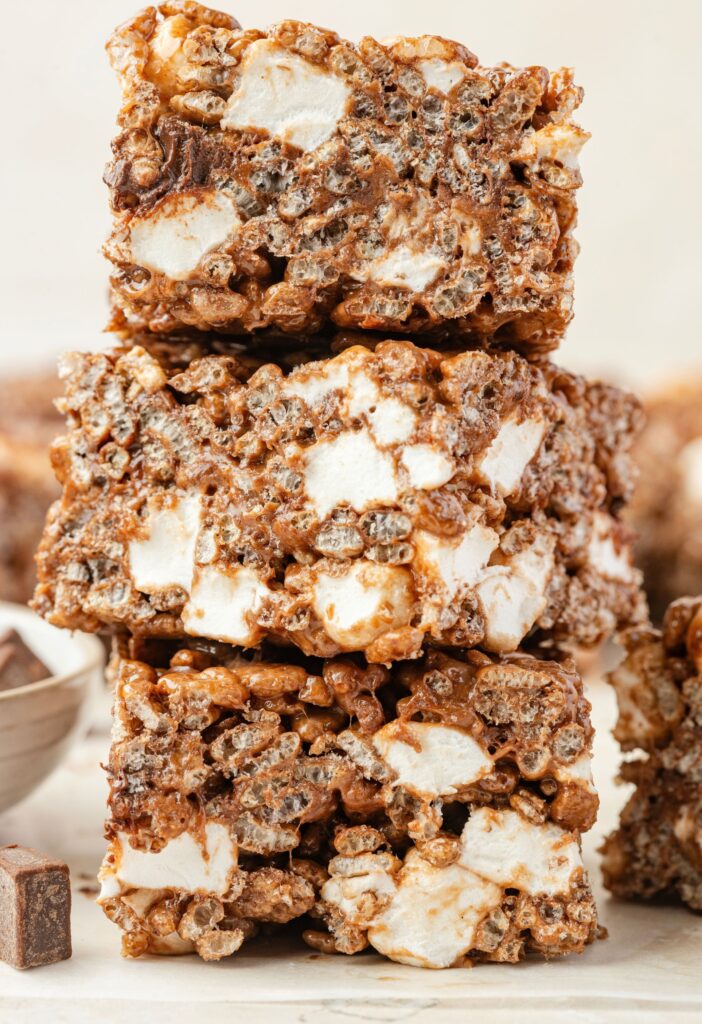 Stack of chocolate rice Krispy treats with mini marshmallows