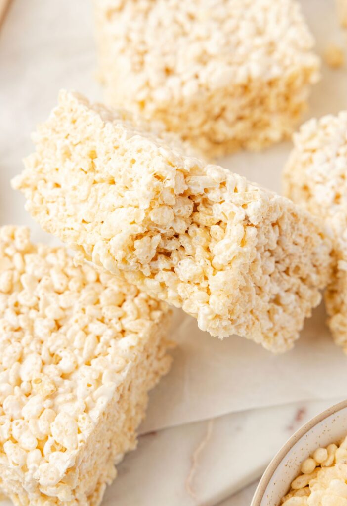 A rice Krispy treat with a bite taken out of it