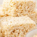 Rice Krispie treats with a bowl of marshmallow cream