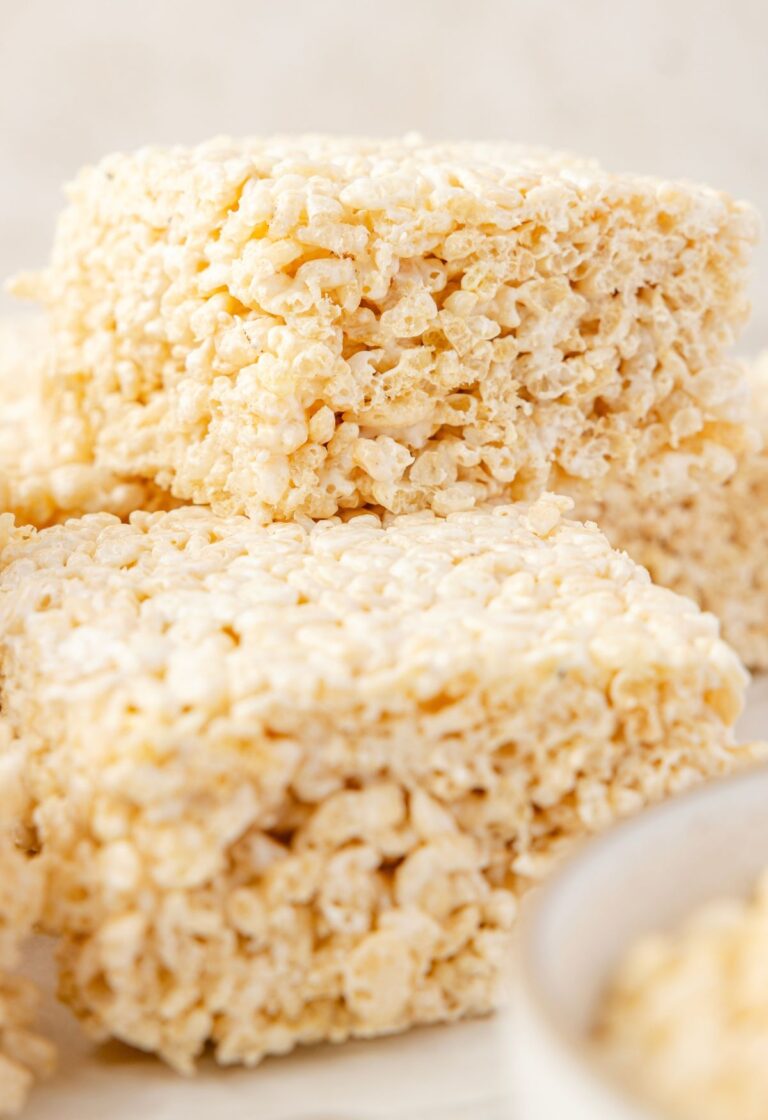 Rice Krispie treats with a bowl of marshmallow cream