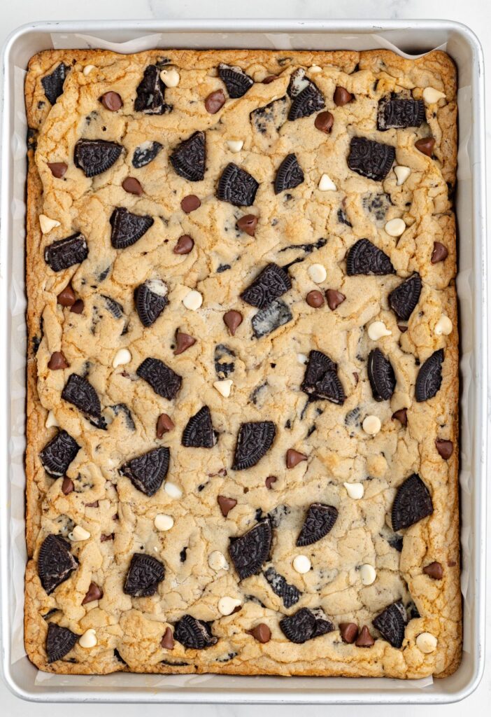The pan with the cookie bars baked inside of it,